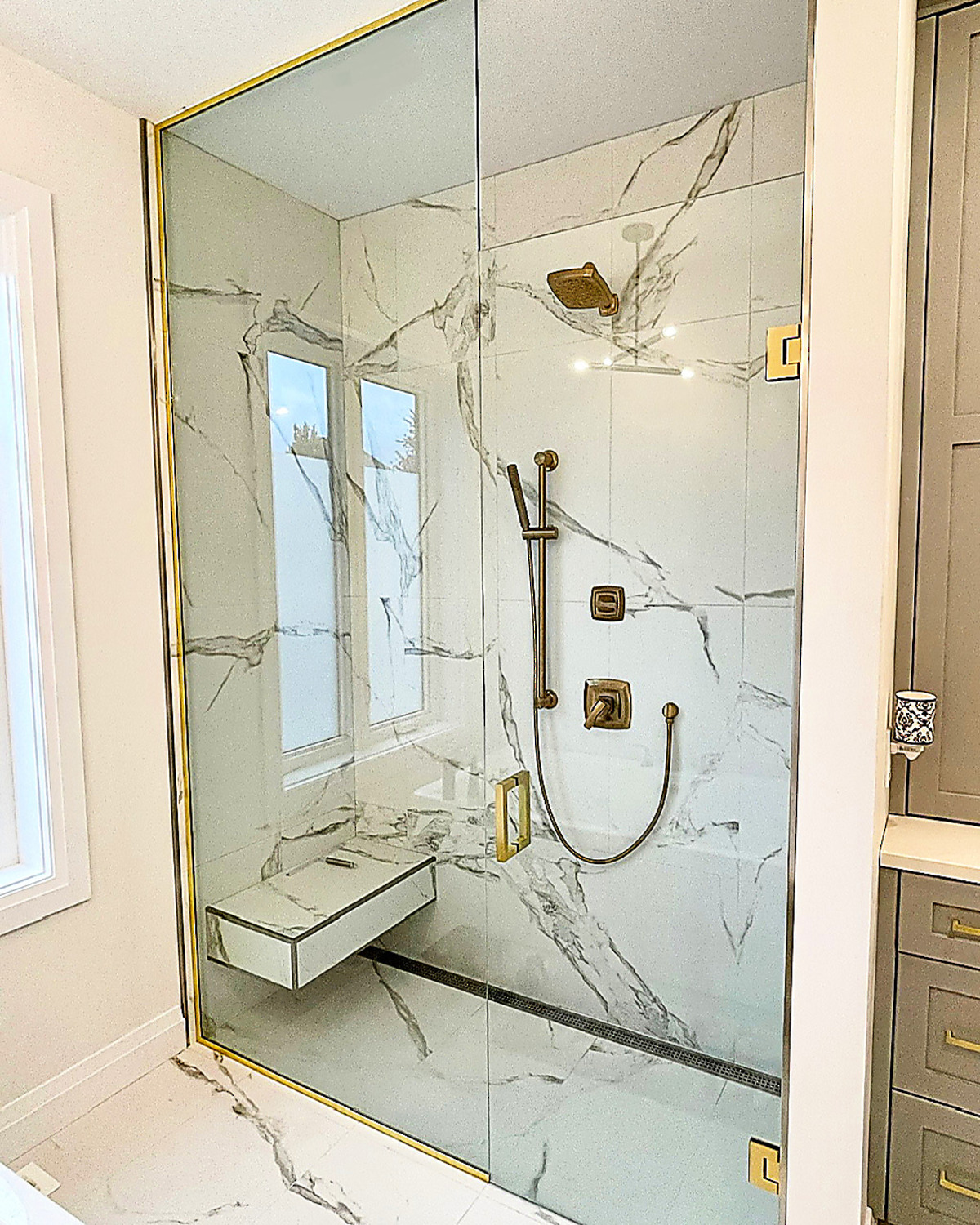 Luxury Marble Shower with Gold Fixtures